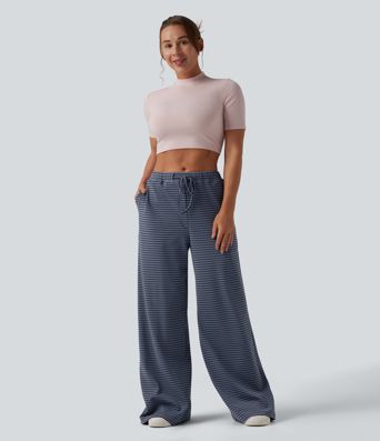 Spodnie typu baggy z wysokim stanem i ściągaczem w paski, z kieszeniami