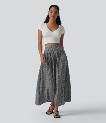 Jupe mi-longue fluide taille haute à carreaux avec poches