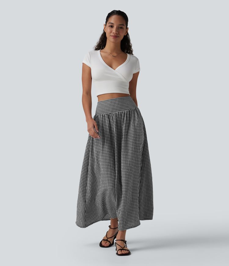 Jupe mi-longue fluide taille haute à carreaux avec poches