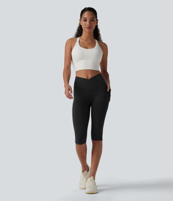 SoftlyZero™ leggings de yoga de talle alto con cinturilla cruzada, estilo pedal‑pusher, con bolsillos — UPF50+
