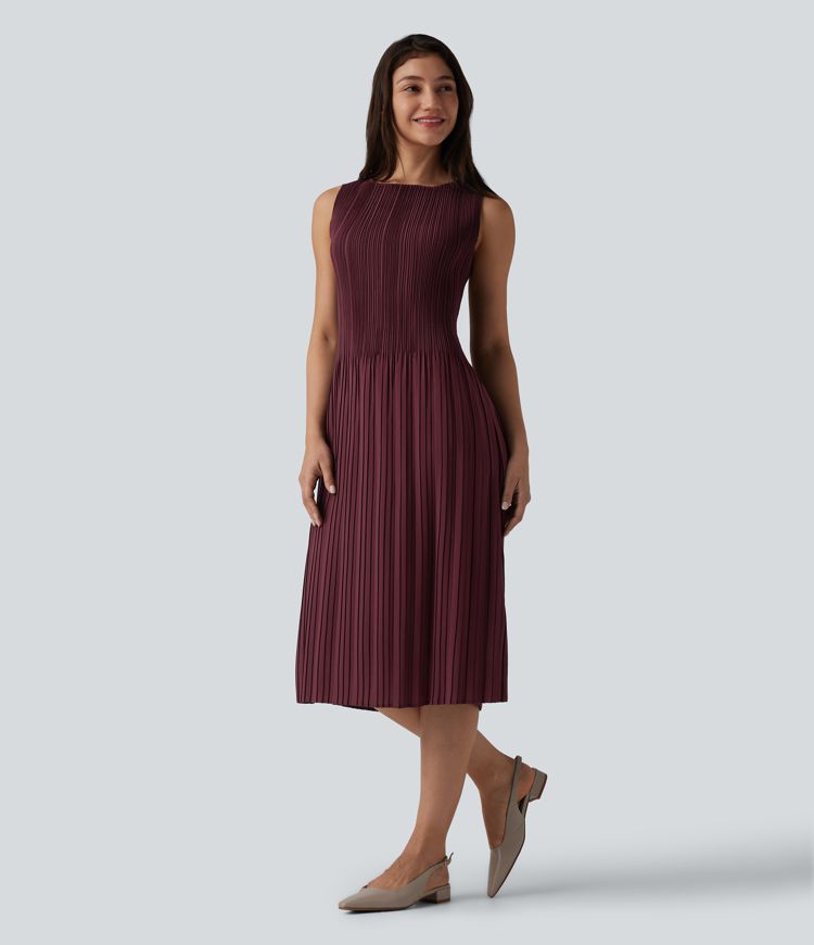 Robe de travail mi-longue plissée, sans manches, à l'encolure bateau et ceinturée