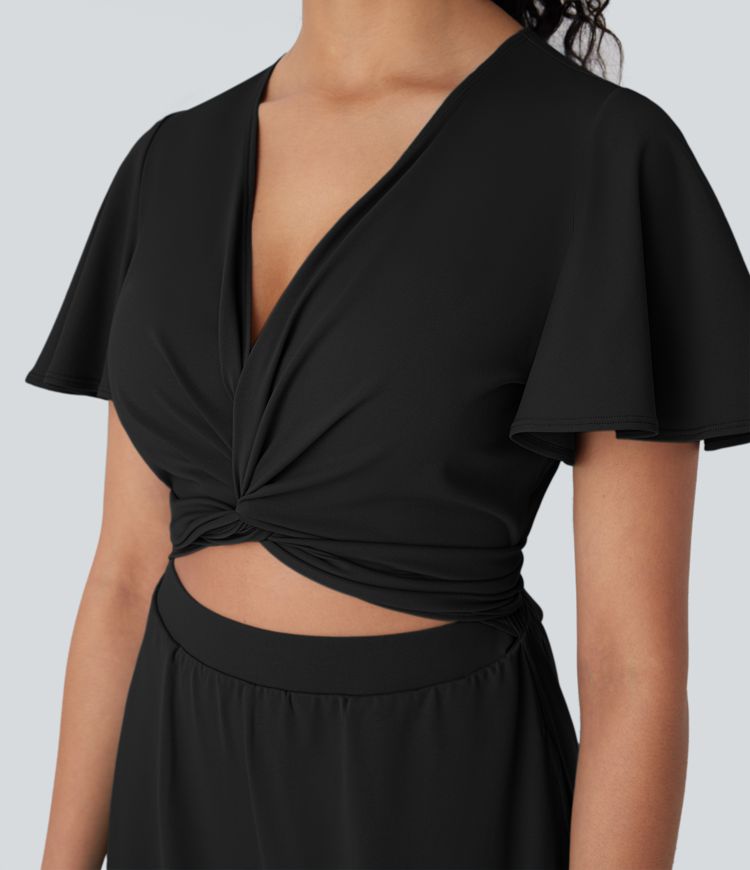 Combinaison fluide décontractée à col V, manches papillon, dos croisé avec lien et poches latérales, jambes amples