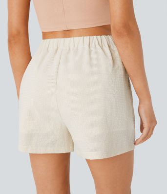 Pantalón corto tiro alto cremallera bolsillo lateral raya 7.5cm