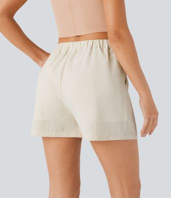 Pantalón corto tiro alto cremallera bolsillo lateral raya 7.5cm