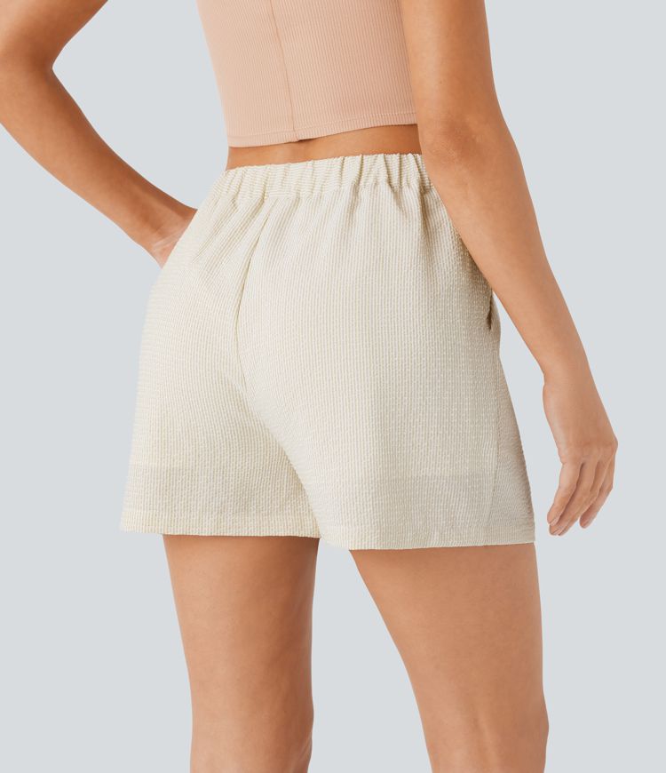 Pantalón corto tiro alto cremallera bolsillo lateral raya 7.5cm