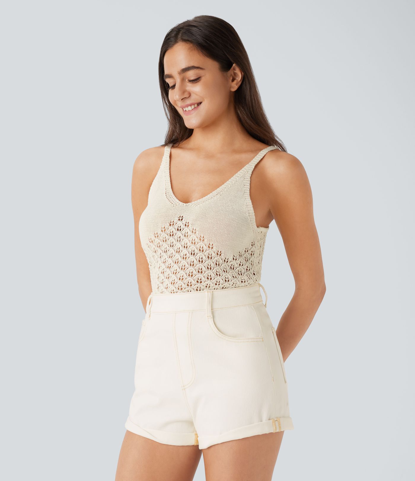 Suéter sin mangas cuello V abertura espalda