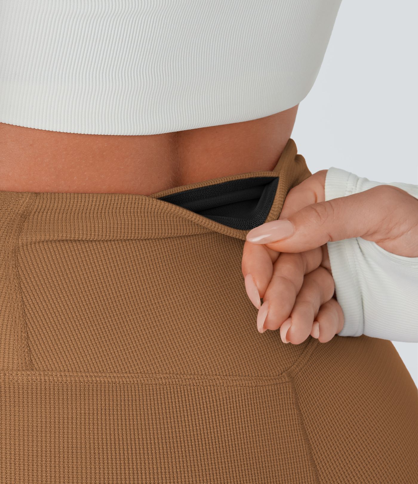 Ristatud kõrge vöökohaga taskutega vabaaja püksid