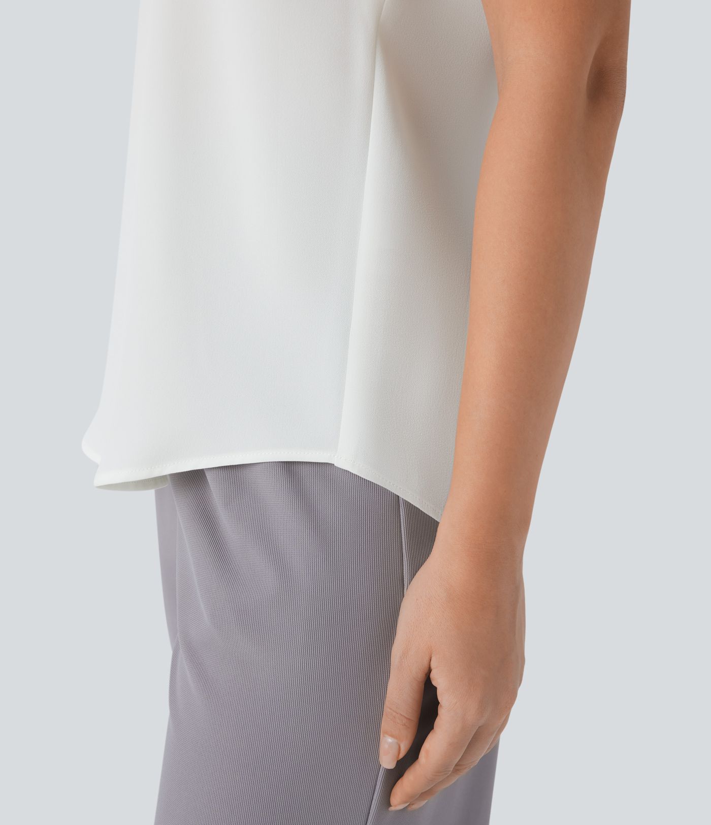 Ärmelloses Arbeitsoberteil mit V-Ausschnitt und dekorativen Knöpfen