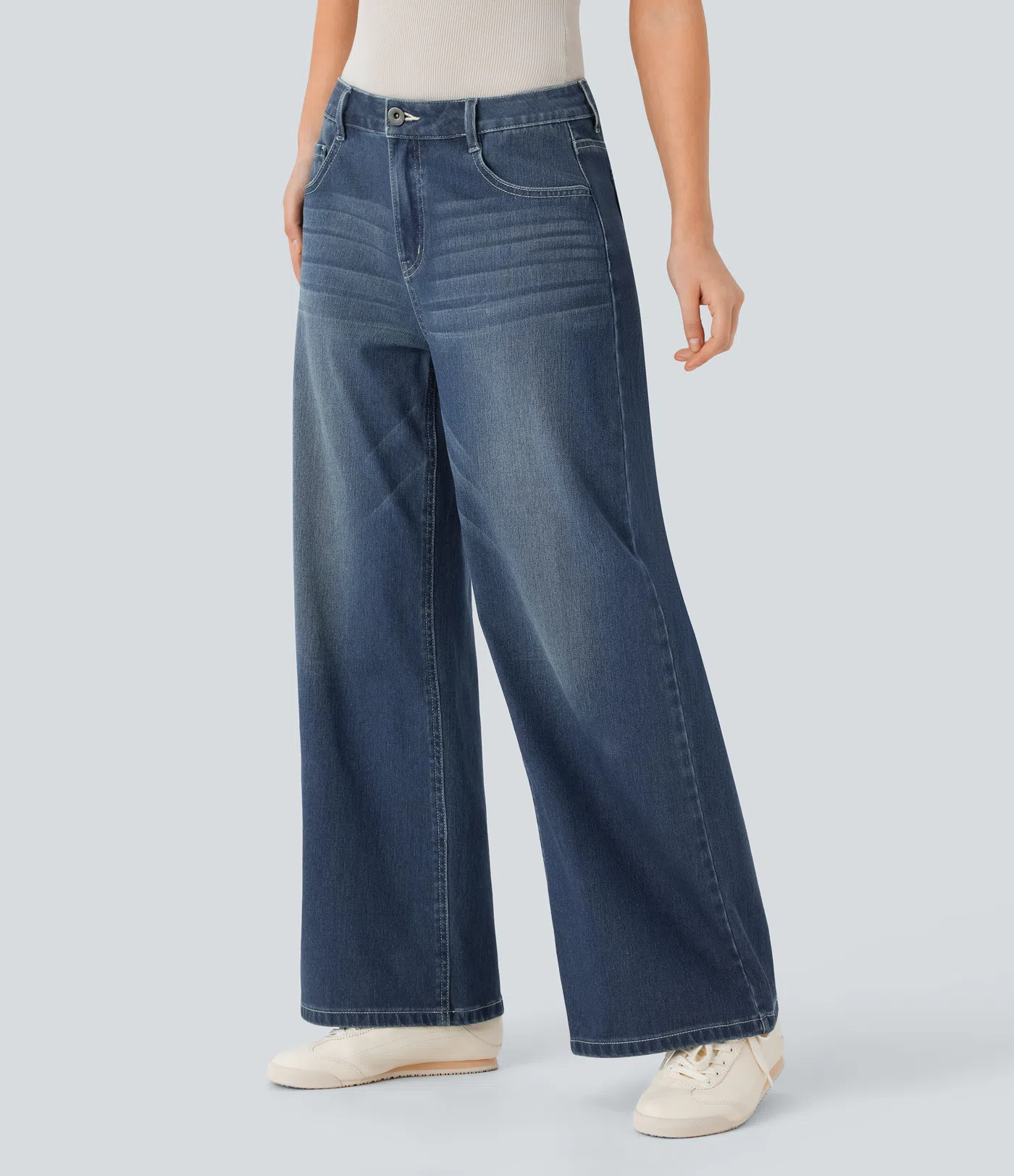 Halara Flex™ Casual, washed baggy jeans in stretch knit denim with a low waist, button, zip fly, multiple pockets and a wide leg