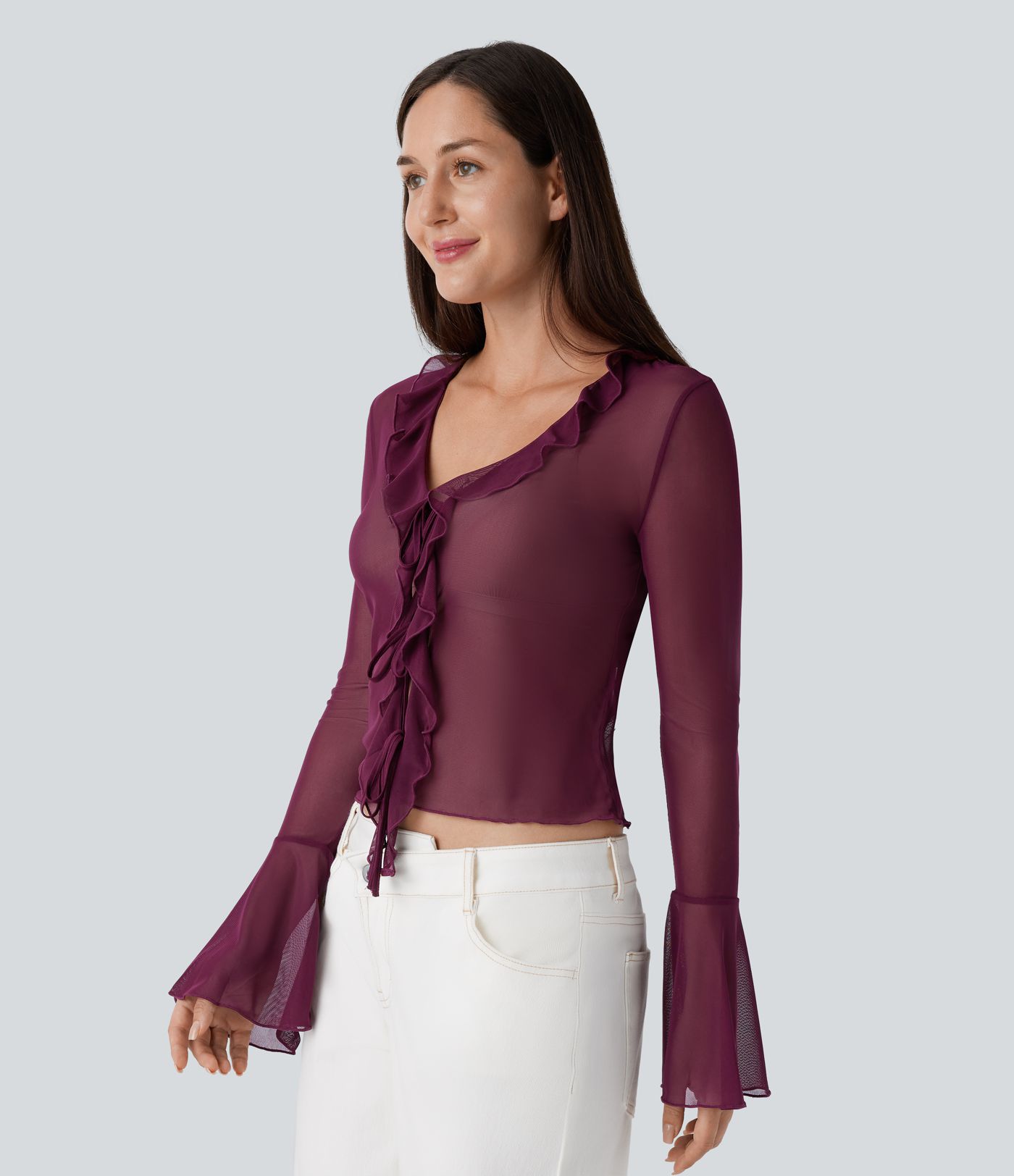 Blusa cuello V manga volante lazo delantera malla transparente