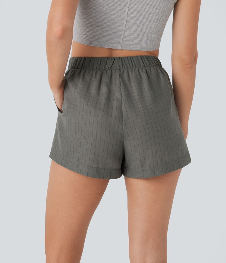 Pantalón corto lino tiro alto bolsillo lateral raya dividida