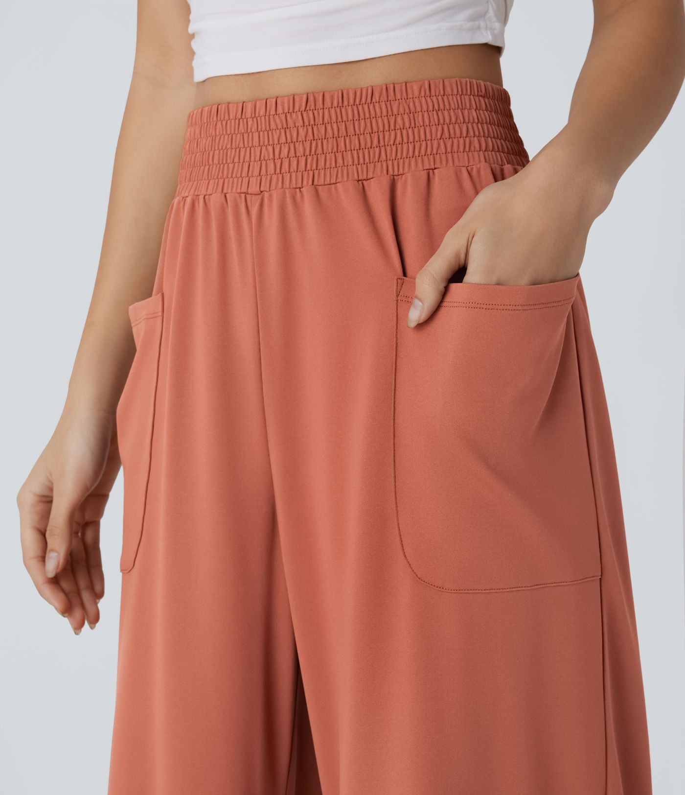 Pantalón pierna ancha bolsillo lateral tiro alto