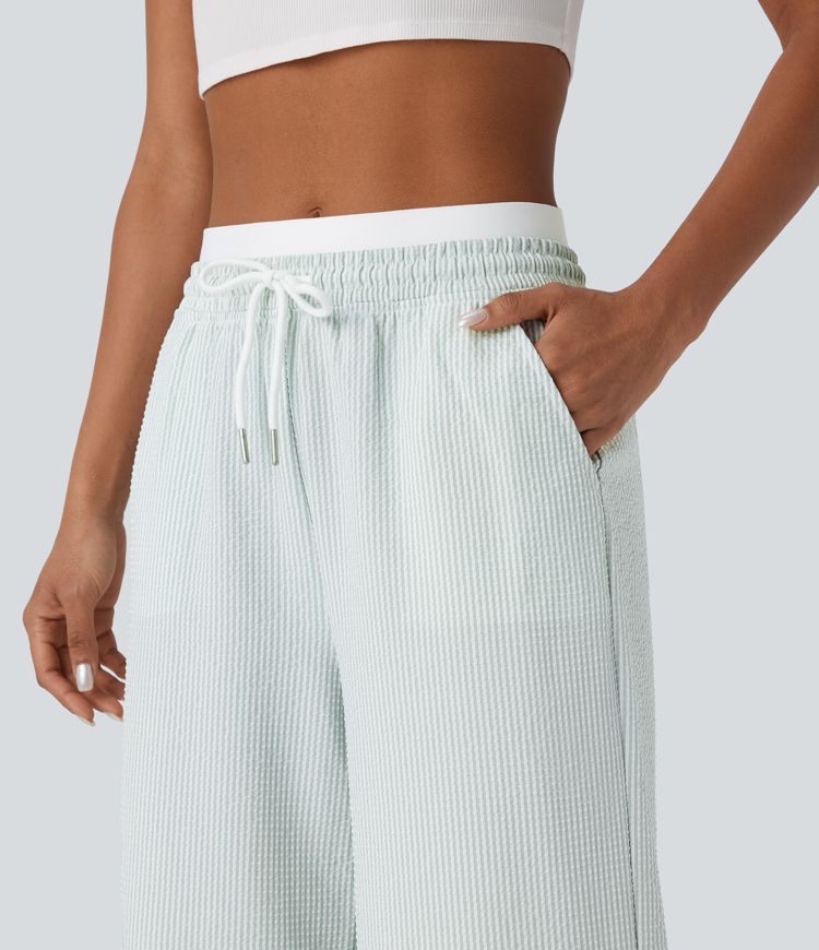 Doppellagige Freizeithose mit mittelhohem Bund, Kordelzug, mehreren Taschen, Streifen und geradem Bein