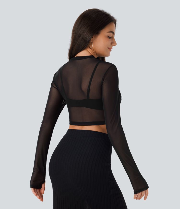 Enges, kurzes Party-Top aus transparentem Mesh mit langen Ärmeln, Rüschen und Daumenloch