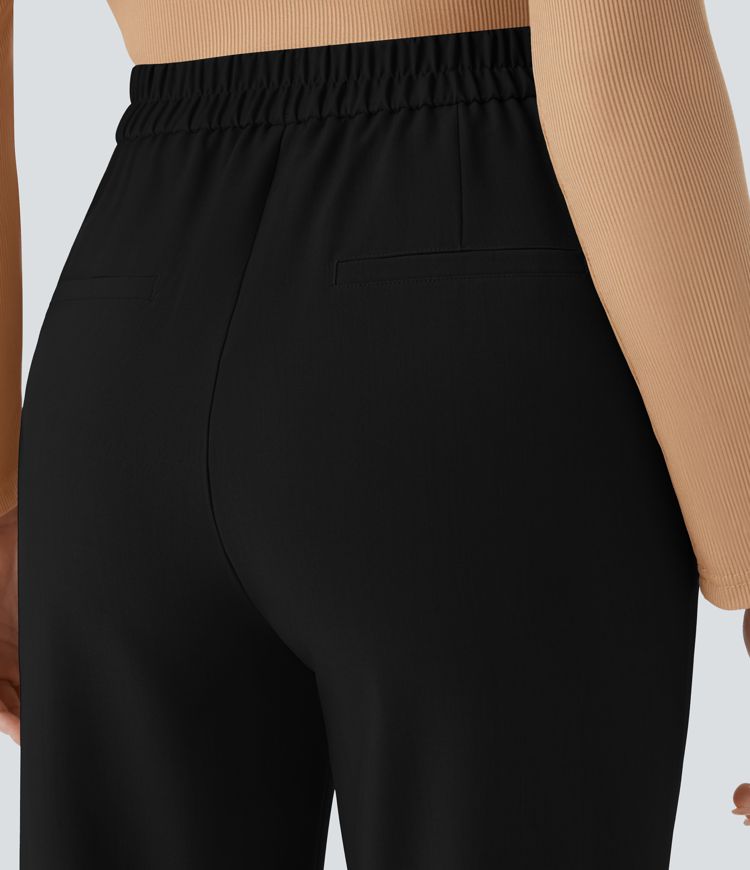 Hoch taillierte, schmal zulaufende Stoffhose mit unsichtbarem Reißverschluss und Seitentasche