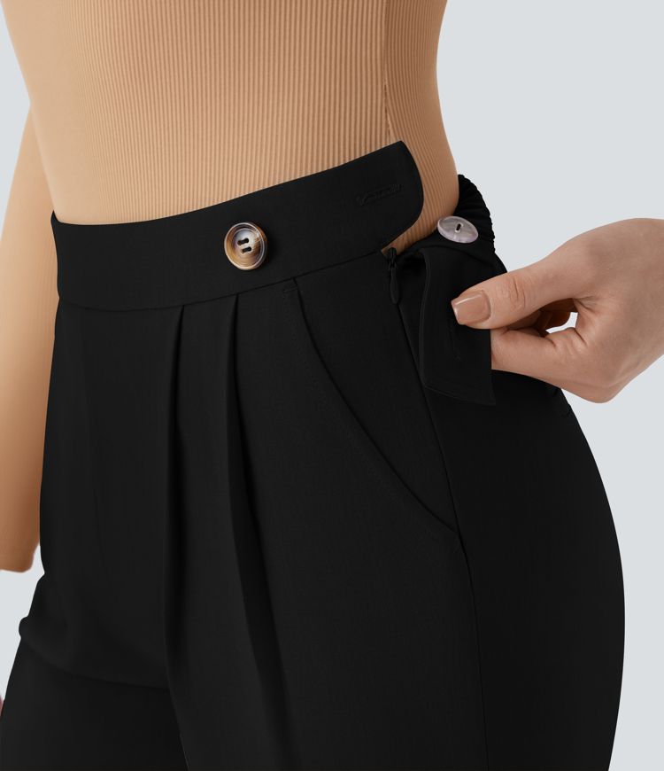 Hoch taillierte, schmal zulaufende Stoffhose mit unsichtbarem Reißverschluss und Seitentasche