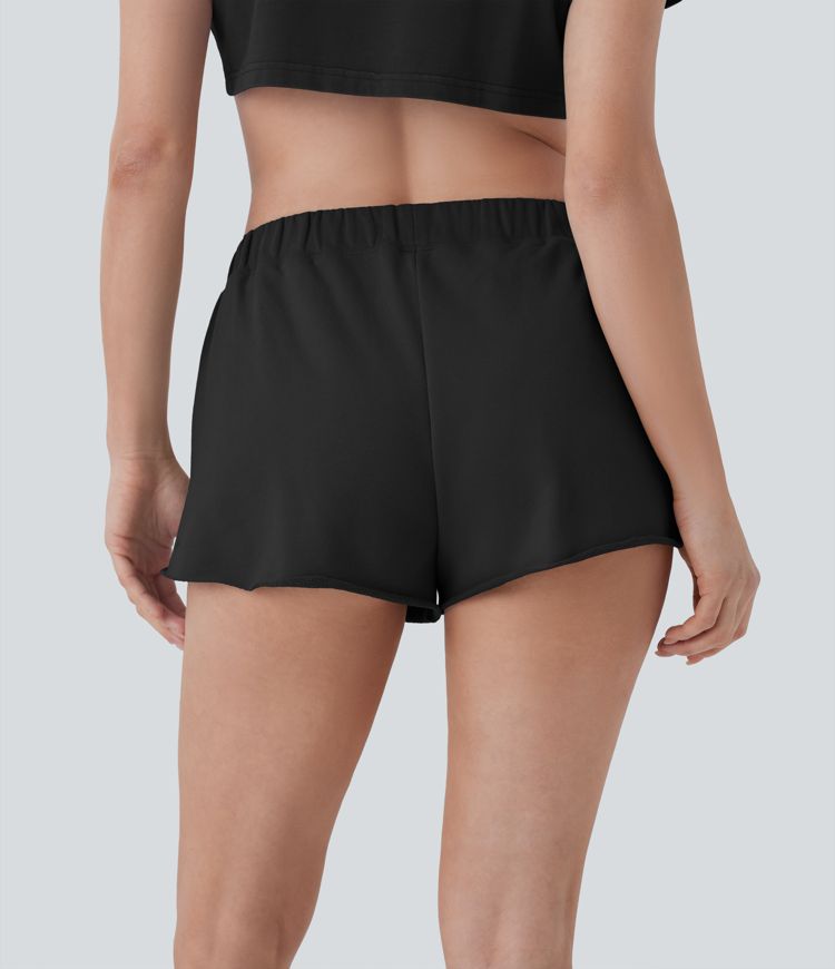 Short de yoga en coton taille mi-haute à poches zippées et ourlet brut