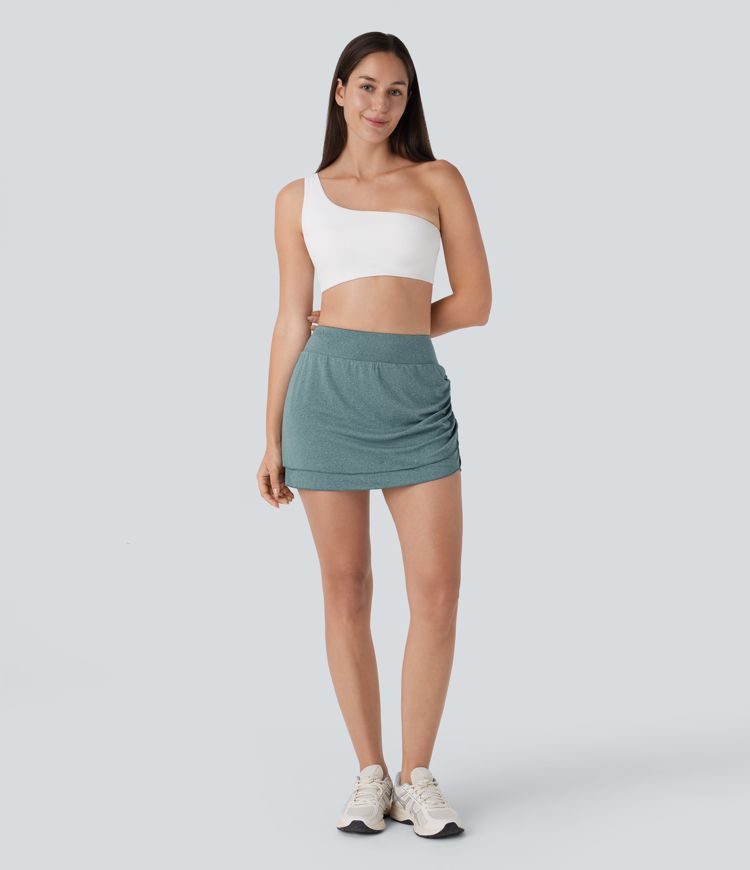 Mini Falda yoga 2 en 1 bolsillo lateral tiro alto dobladillo asimétrico fruncido