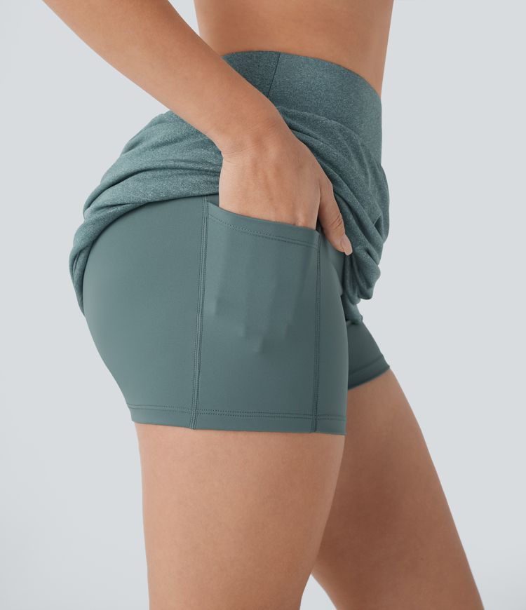 Mini Falda yoga 2 en 1 bolsillo lateral tiro alto dobladillo asimétrico fruncido