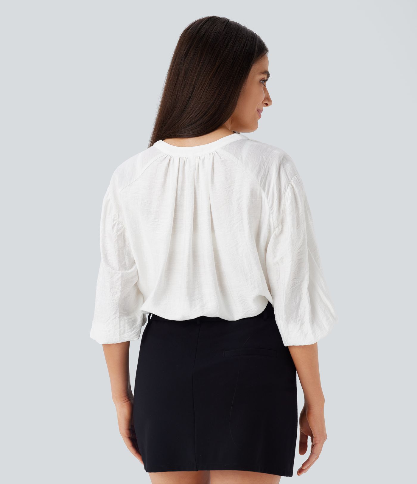 Blusa gran tamaño cuello V manga obispo