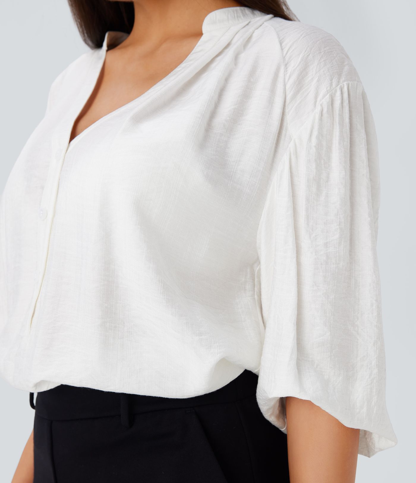 Blusa gran tamaño cuello V manga obispo