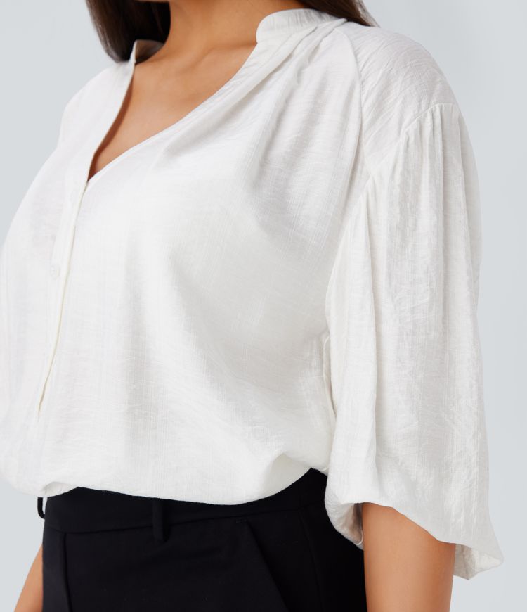 Blusa gran tamaño cuello V manga obispo