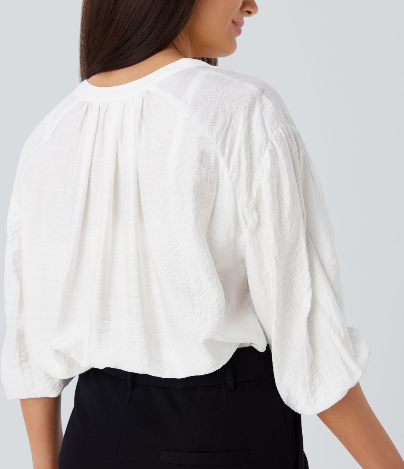 Blusa gran tamaño cuello V manga obispo