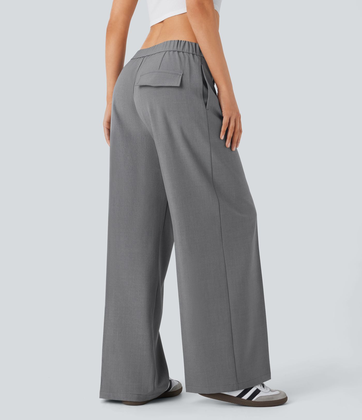 Pantalón pierna ancha bolsillo lateral cremallera tiro bajo