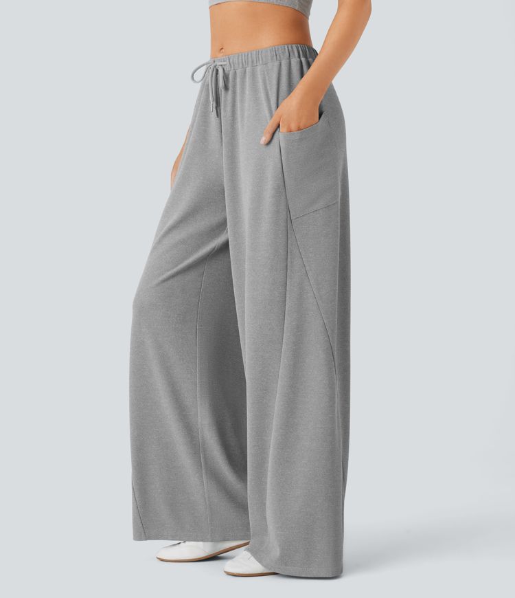 Pantalón pierna ancha bolsillo lateral cordón tiro medio