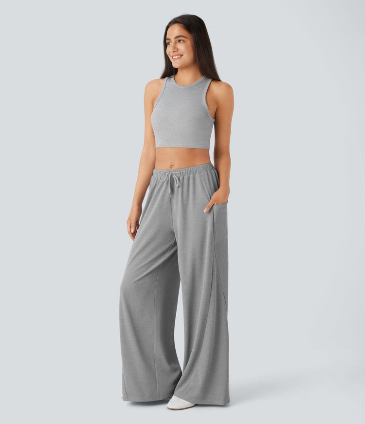 Pantalón pierna ancha bolsillo lateral cordón tiro medio