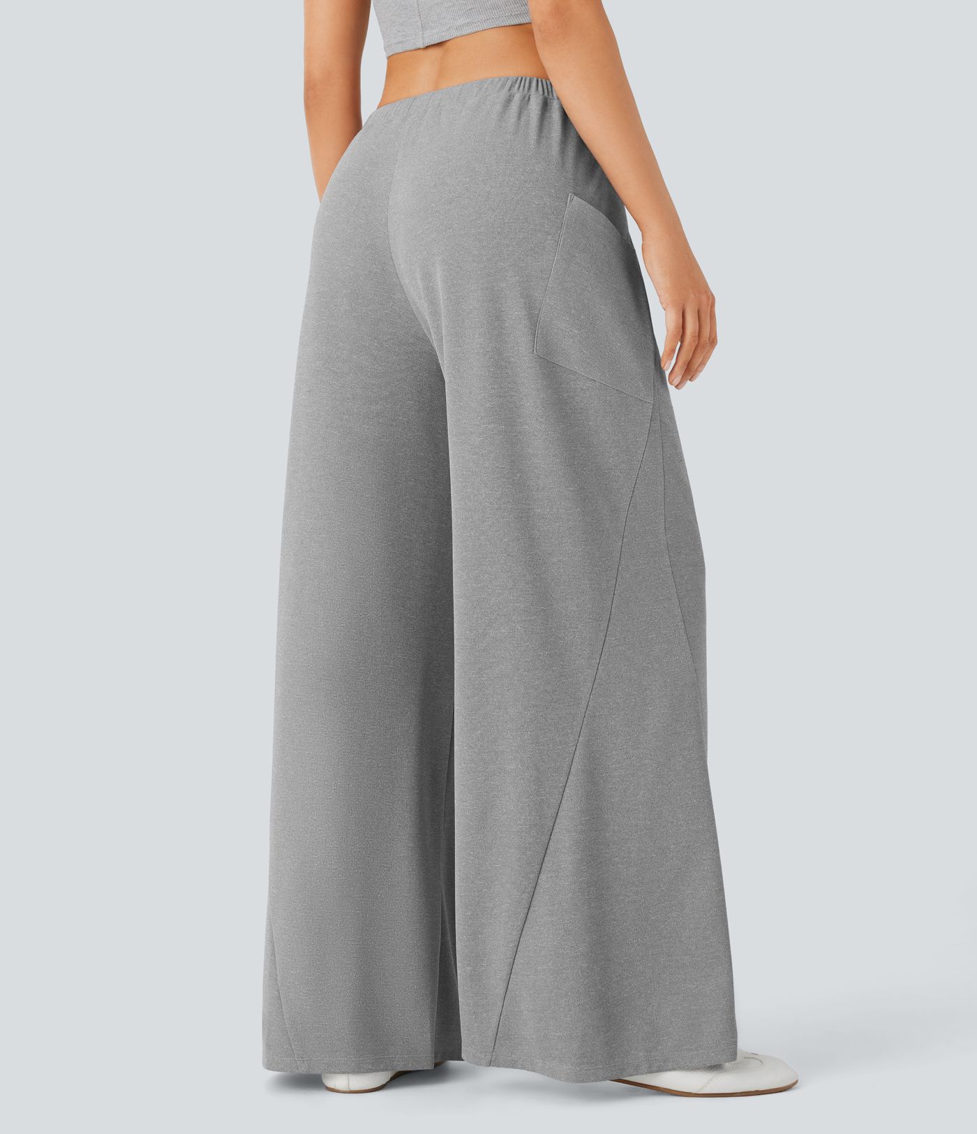 Pantalón pierna ancha bolsillo lateral cordón tiro medio