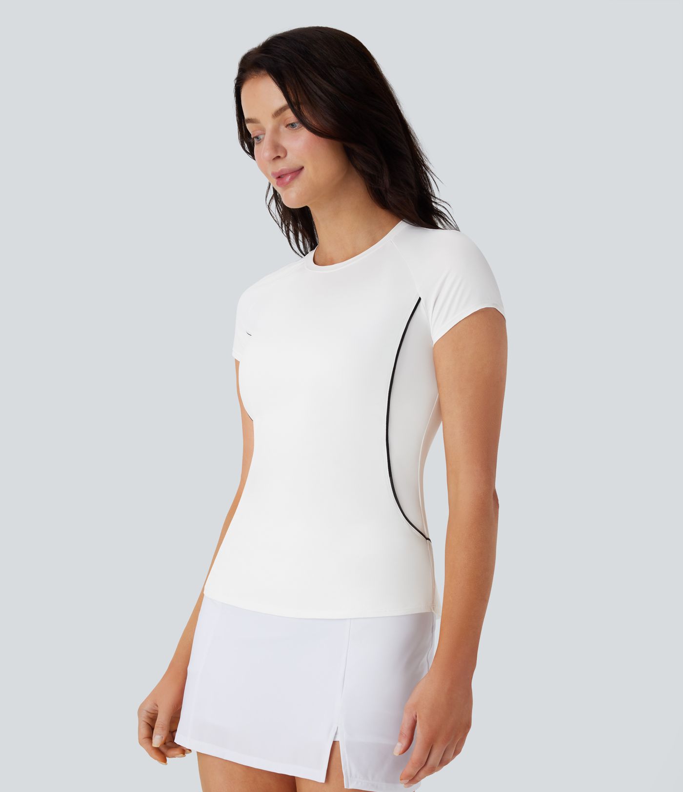 Leichtes, schmales Golf-Sport-Top mit Raglan-Ärmeln, Farbblockband und abgerundetem Saum