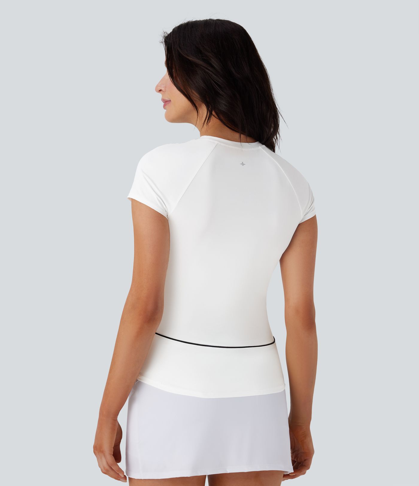 Leichtes, schmales Golf-Sport-Top mit Raglan-Ärmeln, Farbblockband und abgerundetem Saum