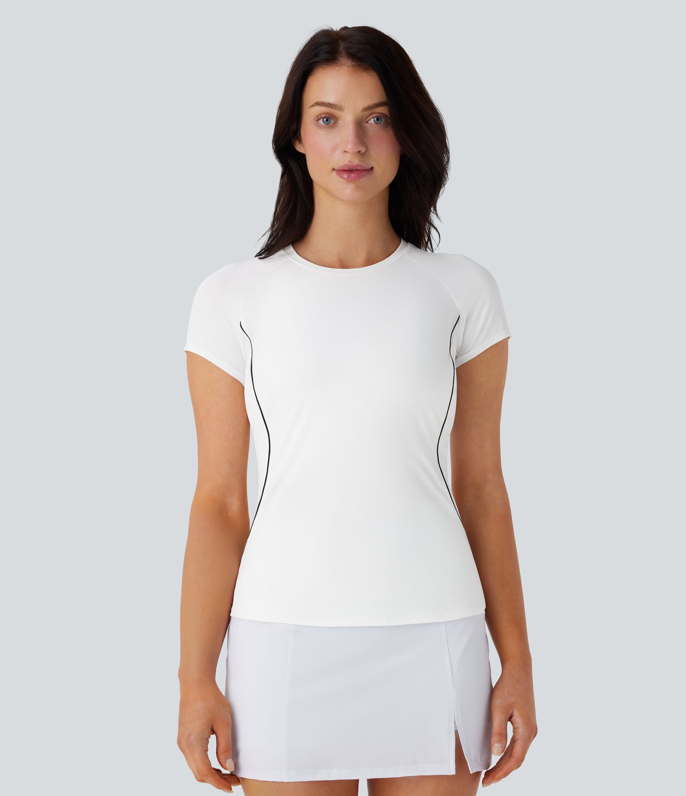 Leichtes, schmales Golf-Sport-Top mit Raglan-Ärmeln, Farbblockband und abgerundetem Saum