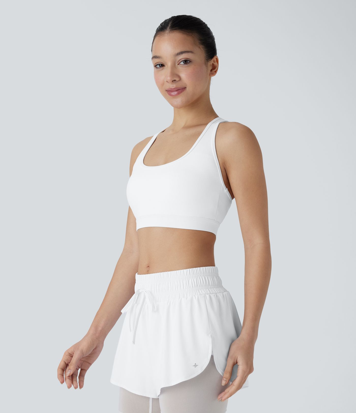 SpeedWave™ - Rückenfreier, perforierter Sport-BH mit mittlerem Support und Racerback - schnelltrocknend