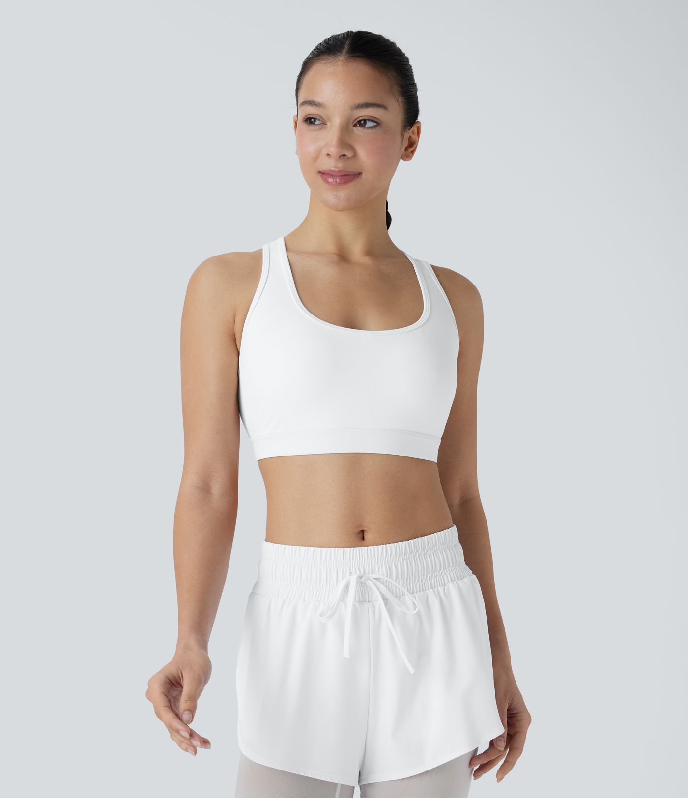 SpeedWave™ - Rückenfreier, perforierter Sport-BH mit mittlerem Support und Racerback - schnelltrocknend