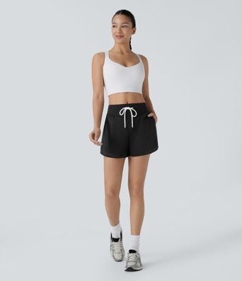 High Waisted Drawstring Side Pocket Cut Out Curved Hem Cool Touch Quick Dry Running Shorts 3''