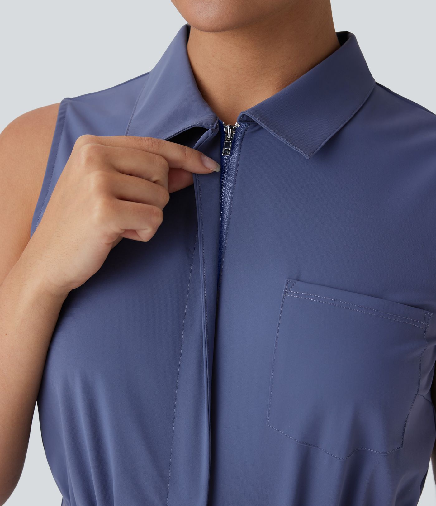 Combinaison de travail à col, sans manches, fermeture éclair et poches multiples