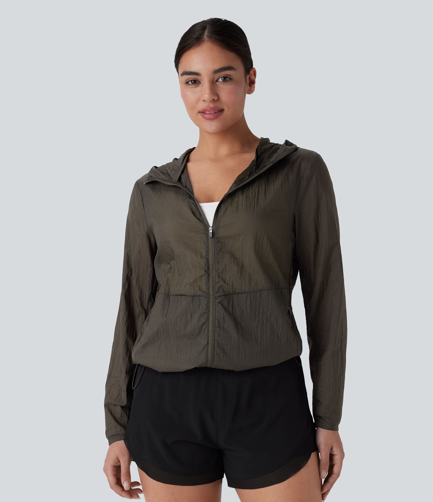 Chaqueta senderismo impermeable capucha manga larga cremallera bolsillo lateral cordón ajustable