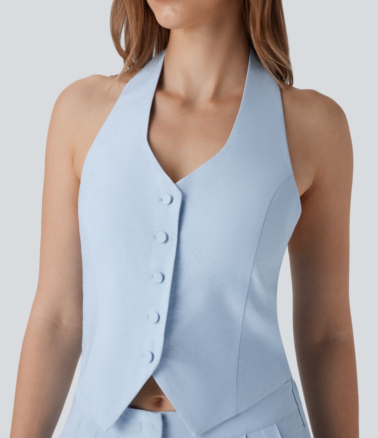 Mono de oficina de pierna ancha con cuello halter botones y bolsillos