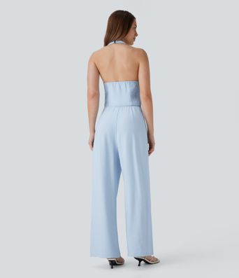 Mono de oficina de pierna ancha con cuello halter botones y bolsillos