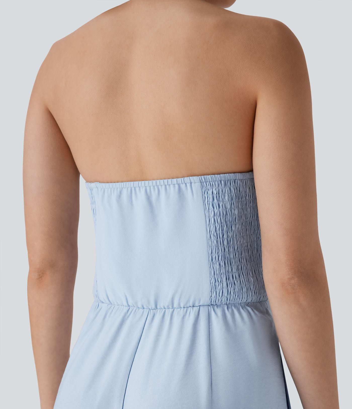 Mono de oficina de pierna ancha con cuello halter botones y bolsillos