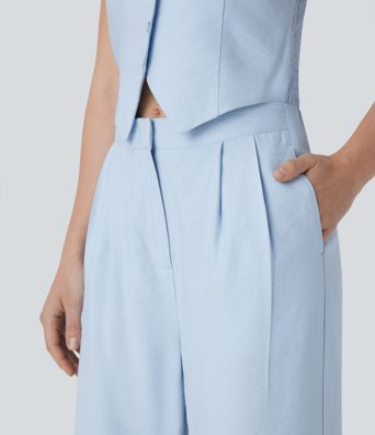 Mono de oficina de pierna ancha con cuello halter botones y bolsillos