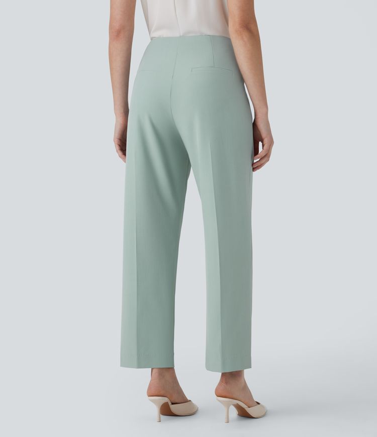 Schmal zulaufende Stoffhose mit hohem Bund, Seitentaschen und unsichtbarem Reißverschluss