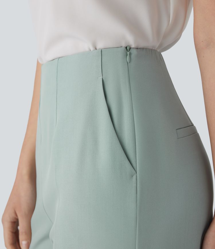 Schmal zulaufende Stoffhose mit hohem Bund, Seitentaschen und unsichtbarem Reißverschluss