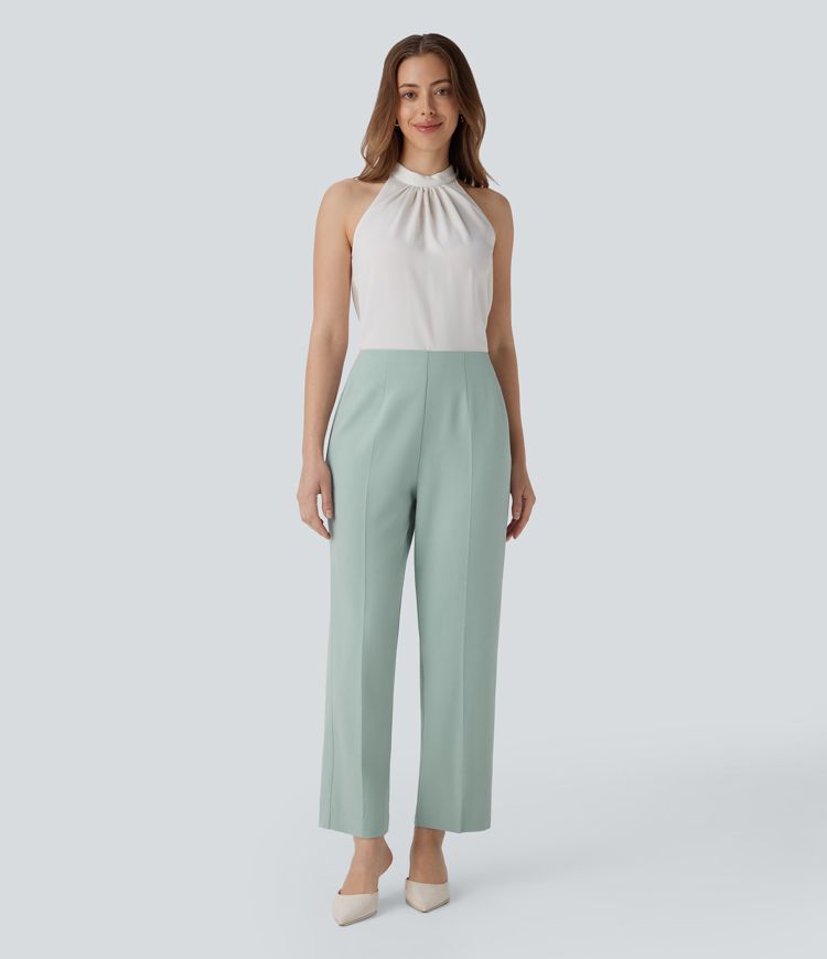 Schmal zulaufende Stoffhose mit hohem Bund, Seitentaschen und unsichtbarem Reißverschluss