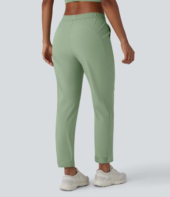 Pantalón entrenamiento tiro medio bolsillo lateral cordón ajustable