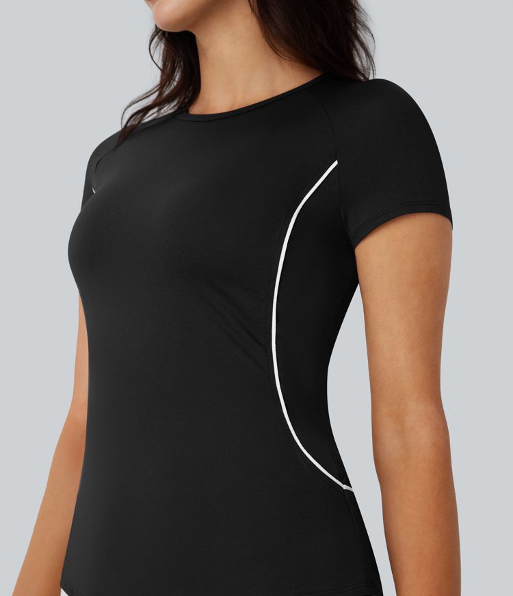 Haut de sport léger pour golf avec manches raglan, blocs de couleur, bande et ourlet arrondi, coupe ajustée