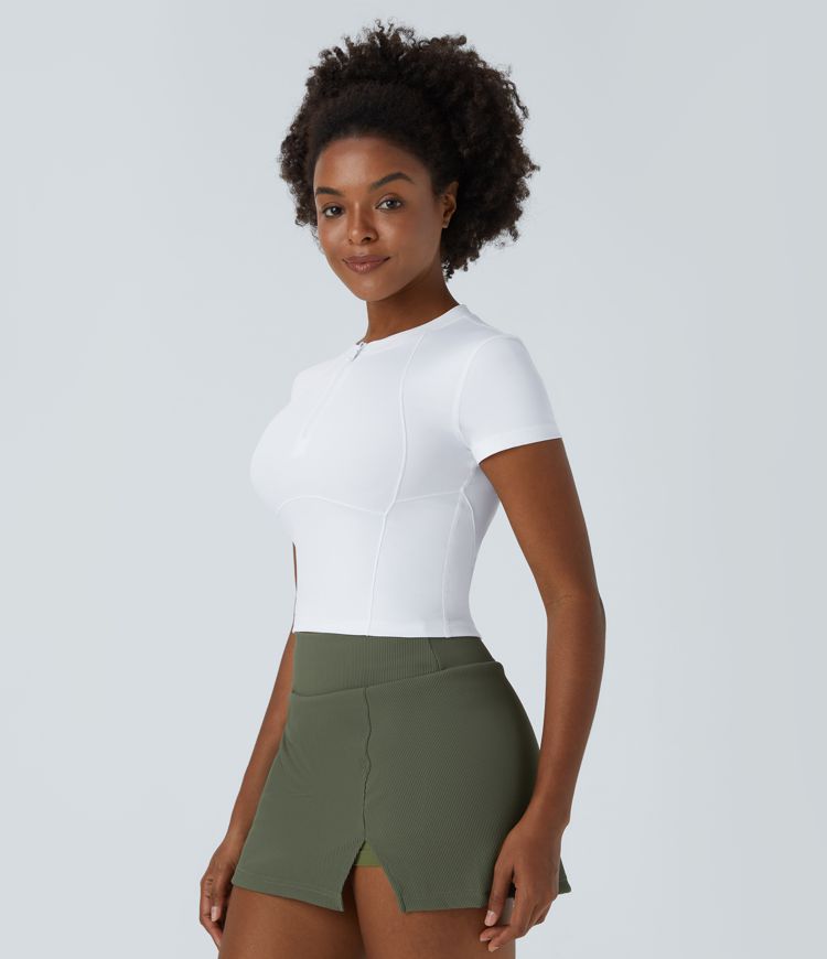 Top corto deportivo golf manga corta media cremallera