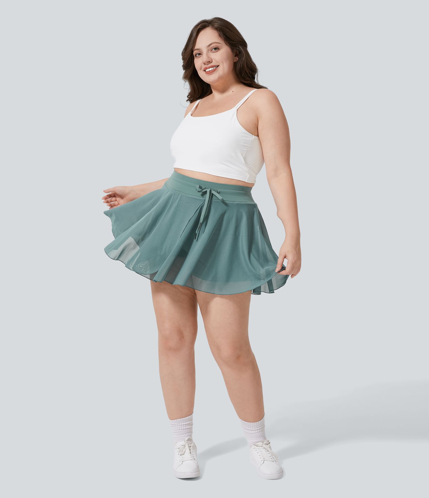 Falda informal de talle alto con cordón en contraste de malla 2 en 1 con bolsillo lateral fluido mini acampanado de talla grande